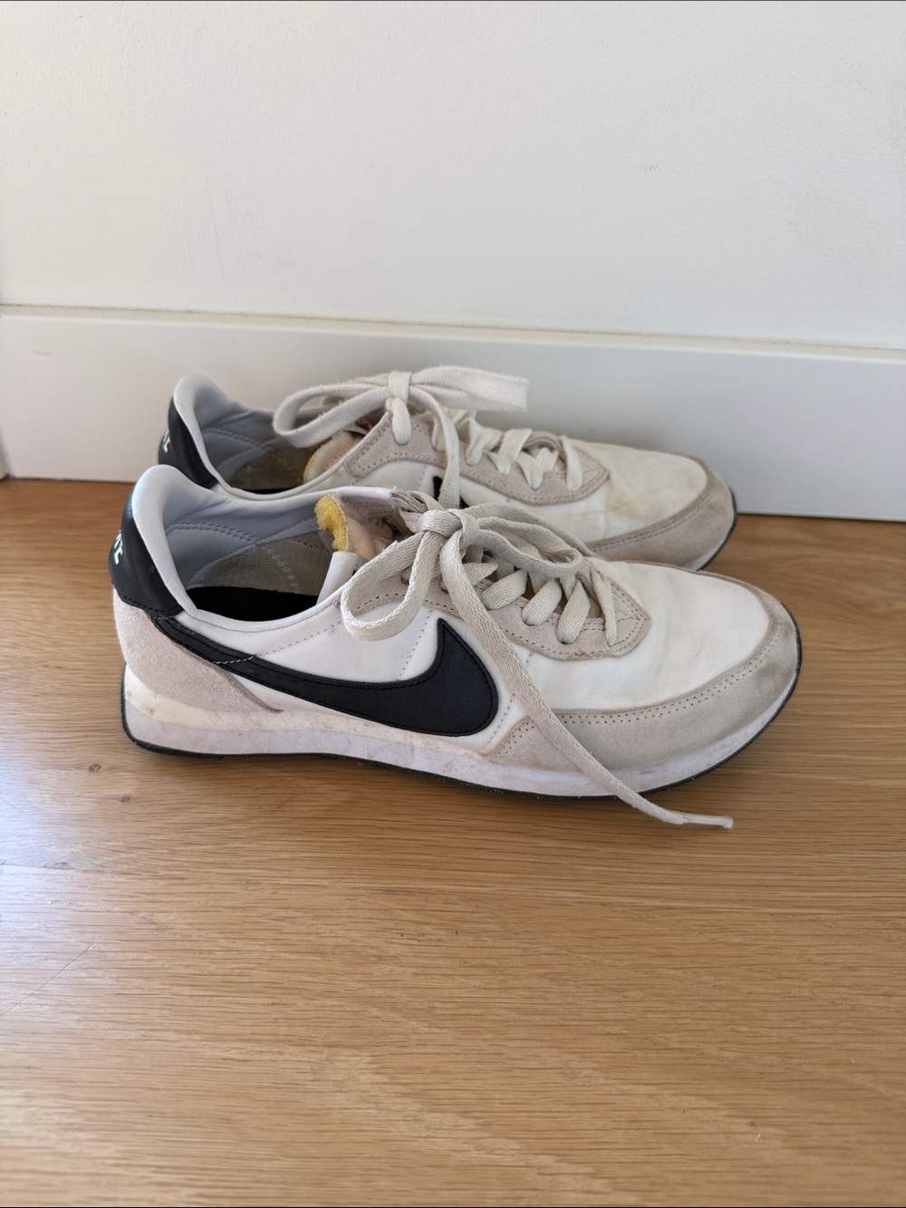 Nike Men’s White Sneakers with Black Swoosh